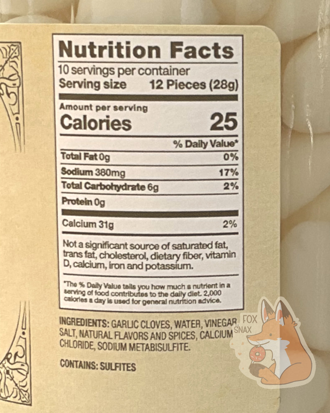 Nutrition facts label on the Picked Habanero Garlic.  It reads: NUTRITION FACTS.  10 SERVINGS PER CONTAINER.  SERVING SIZE 12 PIECES (28 g).  CALORIES 25.  TOTAL FAT 0%.  SODIUM 17%.  TOTAL CARBOHYDRATE 2%
PROTEIN 0g.  CALCIUM 31 MG.  NOT A SIGNIFICANT SOURCE OF SATURATED FAT, TRANS FAT,  CHOLESTEROL, DIETARY FIBER, VITAMIN D, CALCIUM, IRON, AND POTASSIUM.  CONTAINS SULFITES.  An ingredient list is also displayed.