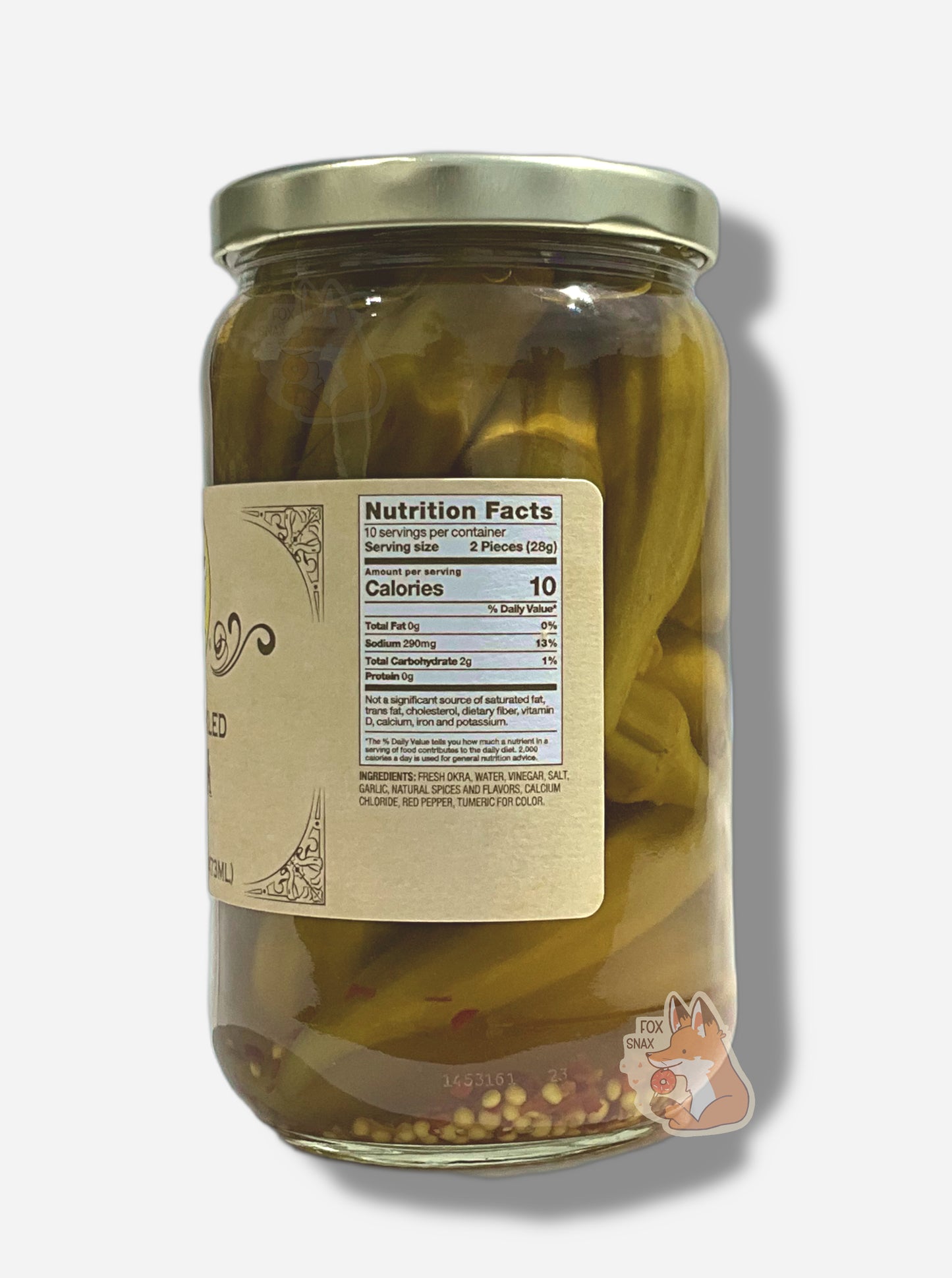 A picture of the right side of a glass jar of Buc-ee'sSpicy Pickled Okra - the label is a "old-timey" sort of white/yellow with flared edges.  The middle reads Ingredients: Fresh Okra, Water, Vinegar, Salt, Garlic, Natural Spices And Flavors, Calcium Chloride, Red Pepper, Tumeric for Color. In the jar, long okra floating in mostly clear brine can be seen; a few sprinkles of red pepper are on the bottom.