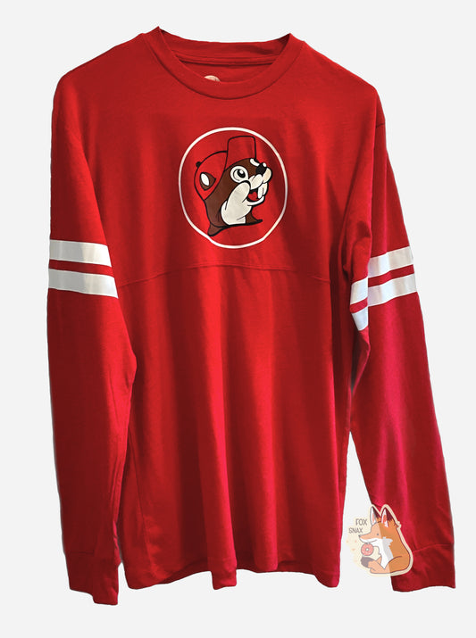 A picture of a long sleeve varsity shirt in red, with two thick white stripes around each of the upper arms.  The Buc-ee the beaver logo is in the middle, with a red ball cap, against a red circle with a white surround.