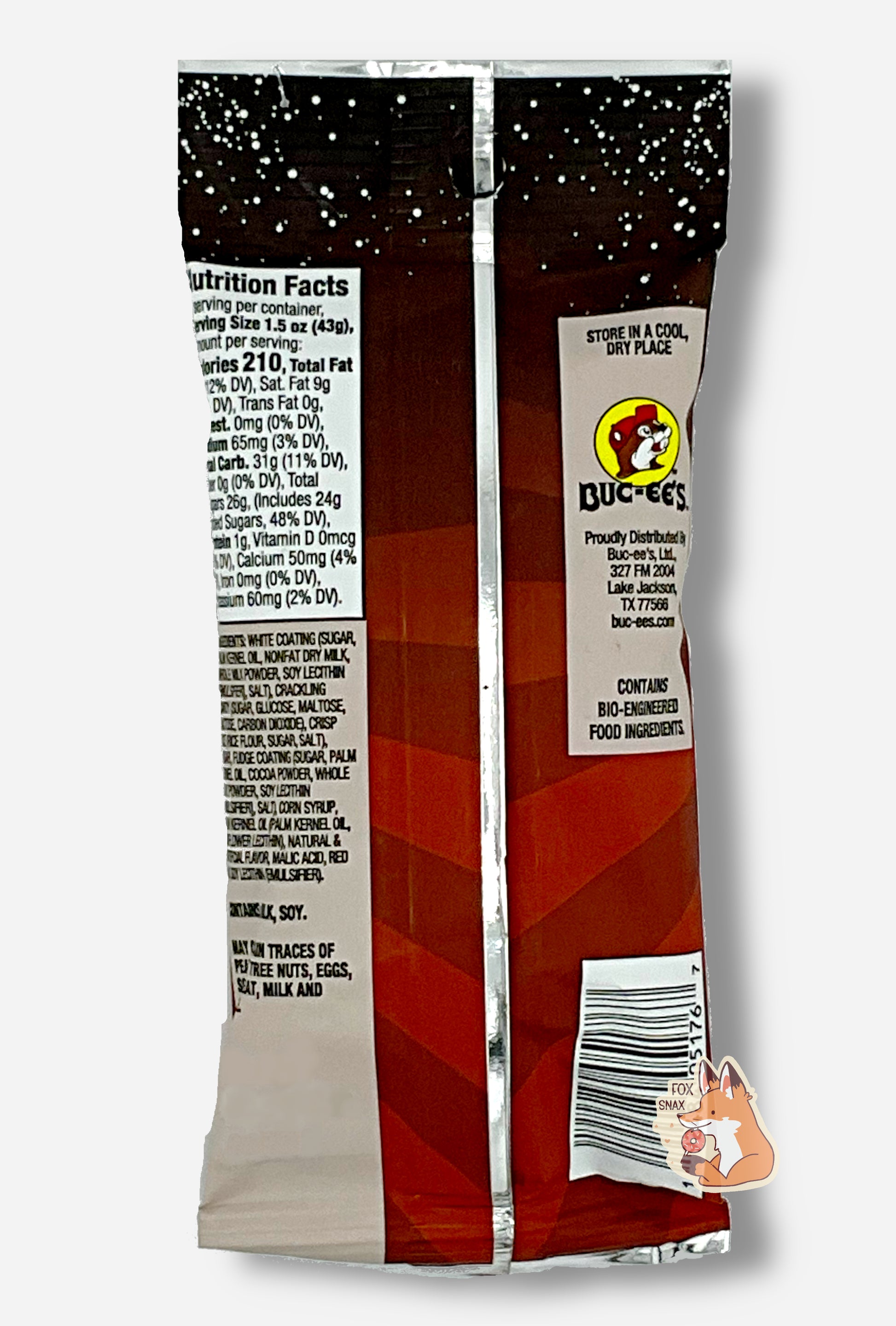A picture of the back of a bag of Buc-ee's Cosmic Pops, in Cherry Cola flavor.  The back of the bag reads STORE IN A COOL, DRY PLACE, then shows a picture of the Buc-ee's beaver logo, then CONTAINS BIO-ENGINEERED FOOD INGREDIENTS.