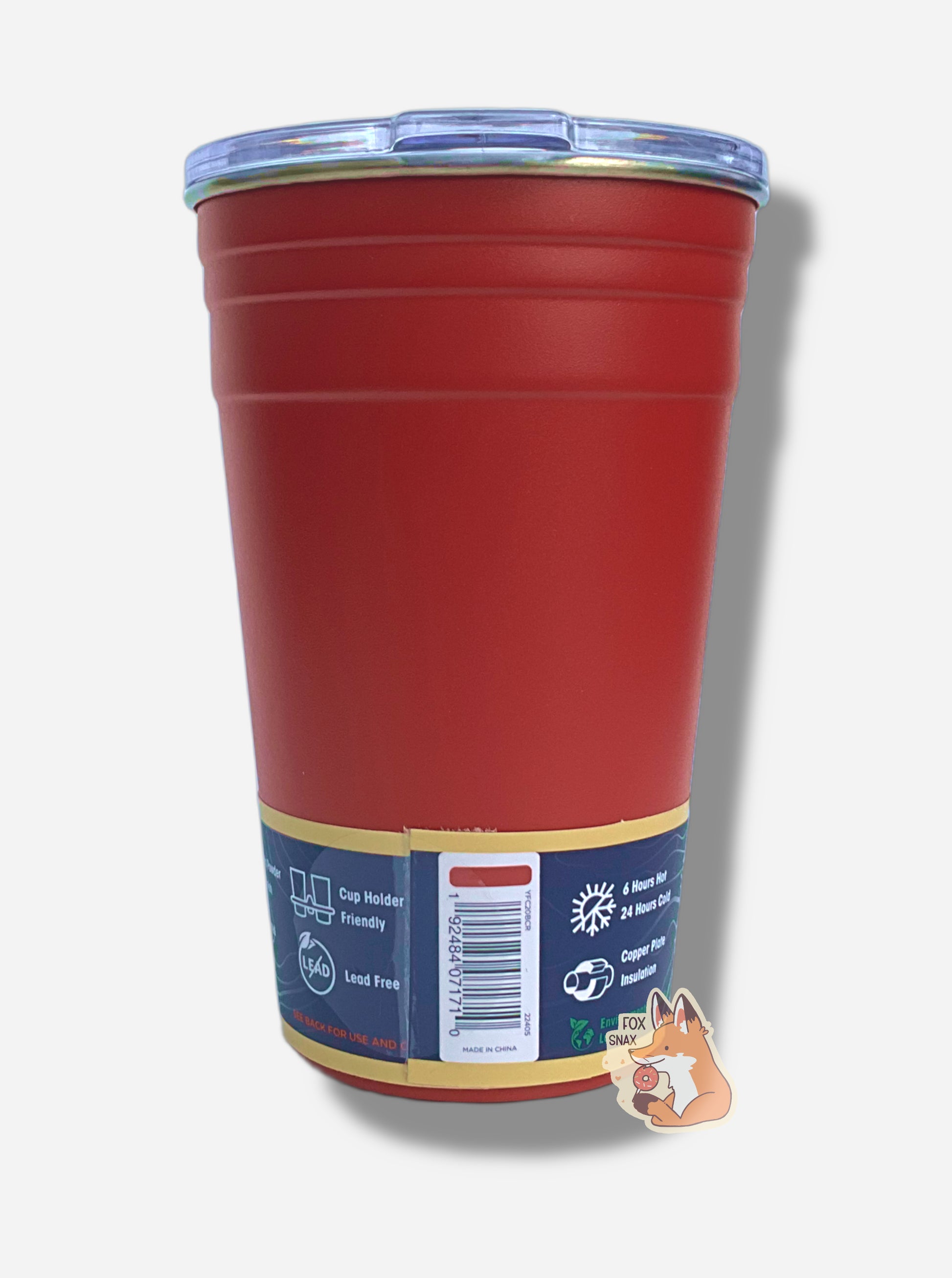 A picture of the back of a medium sized red "party" cup,  The surface of the cup  is red paint over metal.  The top of the cup features a clear plastiic lid.  The bottom surface is black plastic, and acts as a nice grippy surface so the cup doesn't slide around.  The paper band on the bottom reads: DuraGrip Powder Coat Finish, Graduated Inner, Cup Holder Friendly, Lead Free