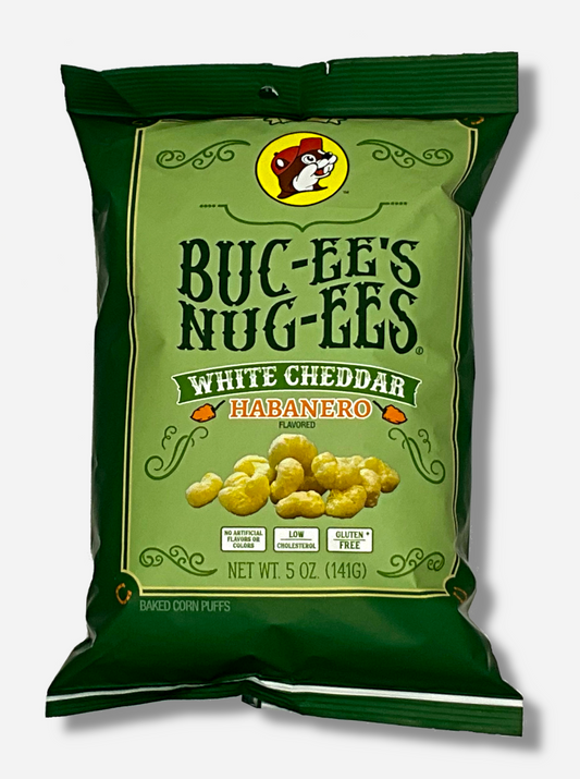 A picture of the front of a opaque, dark green and light green bag of Buc-ee's Nug-ees White Cheddar Habanero which are puffed corn snack with white cheddar and habanero pepper flavor, and has a picture of Buc-ee the Beaver on it.  The bag reads White Cheddar Habanero Flavored, No Artificial Colors or Flavors, Low Cholesterol, Gluten Free, Baked Corn Puffs.