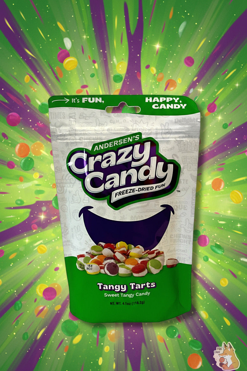 A large bag of Andersen's Tangy Tarts.  The front of the bag also says Sweet Tangy Candy, Net Weight 4.1 oz.  It's Fun, Happy, Candy.  The top and bottom of the bag are pink, and the background is a large purple smile against a white background.  The background behind the bag shows an explosion of green and purple color; tarts can be seen exploding out of the bag as well.