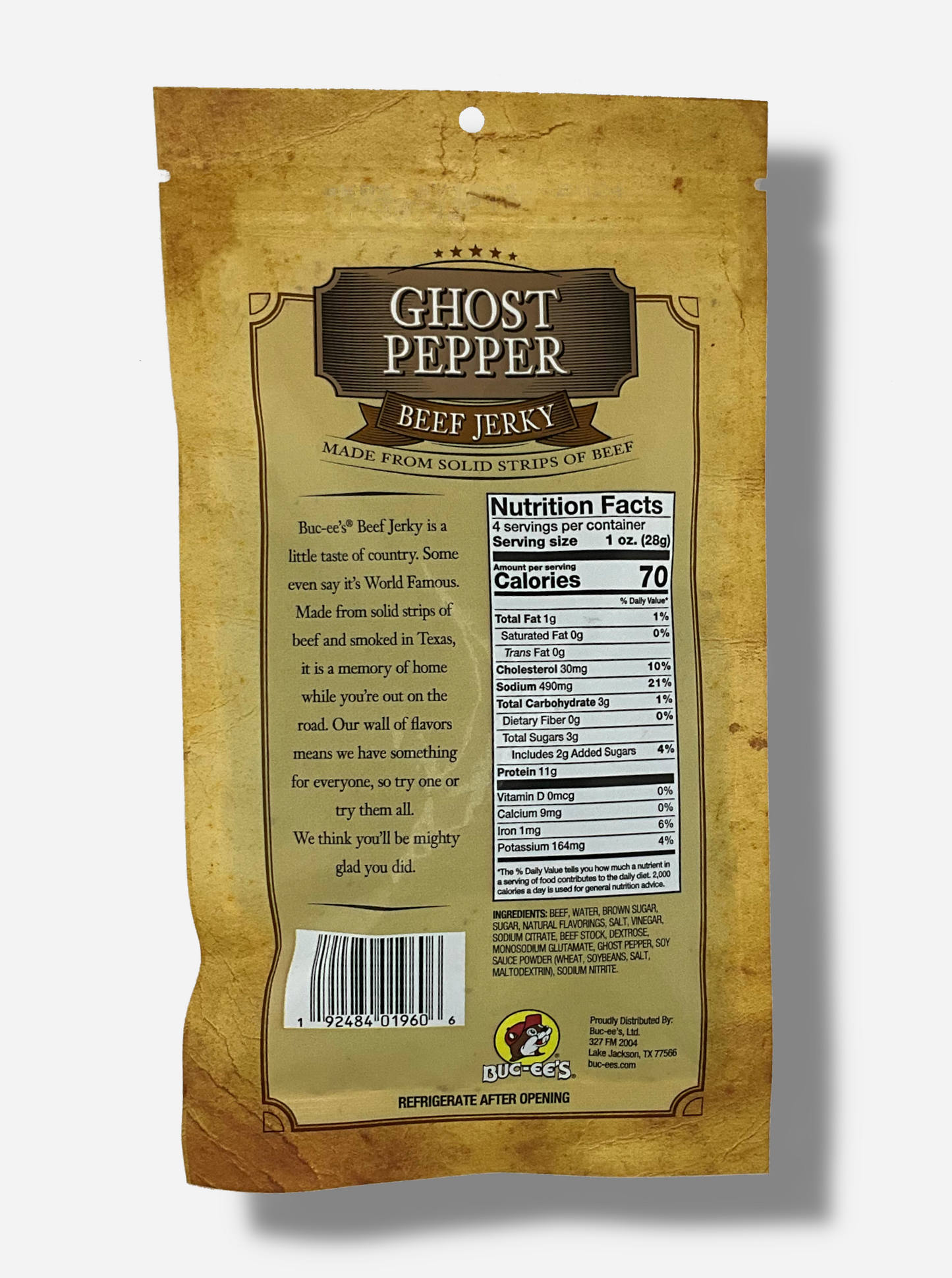 A picture of the back of a tan plastic bag of Buc-ee's Ghost Pepper Beef Jerky.  The label underneath reads 'Buc-ee's Beef Jerky is a little taste of country.  Some even say it's World Famous.  Made from solid strips of beef and smoked in Texas, it is a memory of home while you're out on the road.  Our wall of flavors means we have something for everyone, so try one or try them all.  We think you'll be mighty glad you did.'