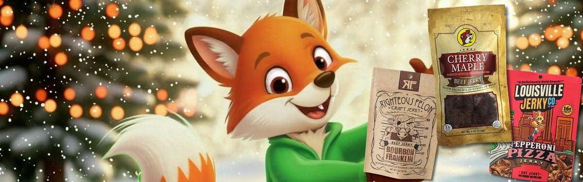 Fox Snax fox in a snowy holiday scene with bags of Righteous Felon Bourbon Franklin, Buc-ee's Cherry Maple and Louisville Jerky Co. Pepperoni Pizza jerky