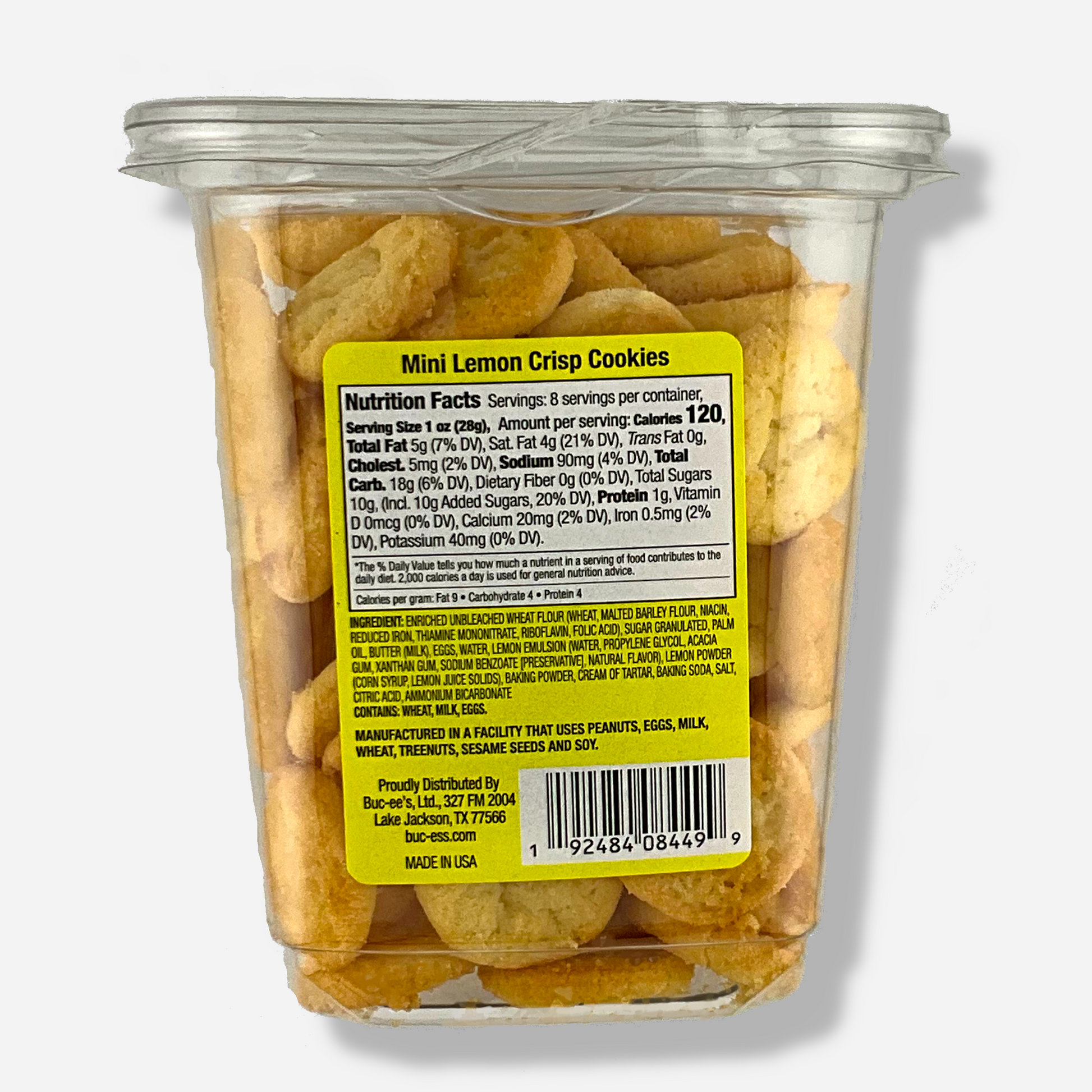 The back of a clear plastic, tall, rectangular package of Buc-ee's Mini Lemon Crisp Cookies.  The back label reads Manufactured in a facility that uses Peanuts, Eggs, Milk, Wheat, Treenuts, Sesame Seeds and Soy.