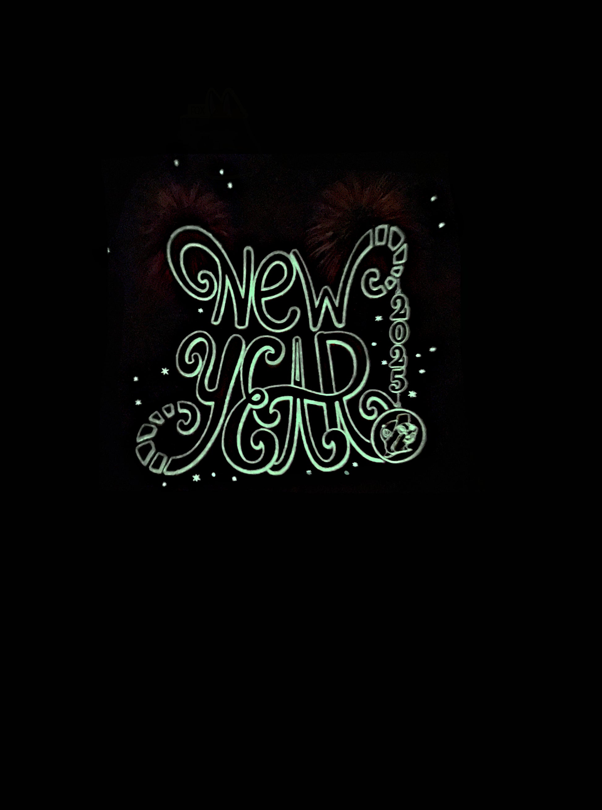 A picture of the back of a glowing green t-shirt.  The center of the t-shirt reads in a curly glowing green font, NEW YEAR 2025, then underneath of it, SAME BUC-EE'S OBSESSION.  The bottom right of the shirt has the Buc-ee's logo, in glowing green The background behind the text is a series of exploding fireworks, dots, and stars.