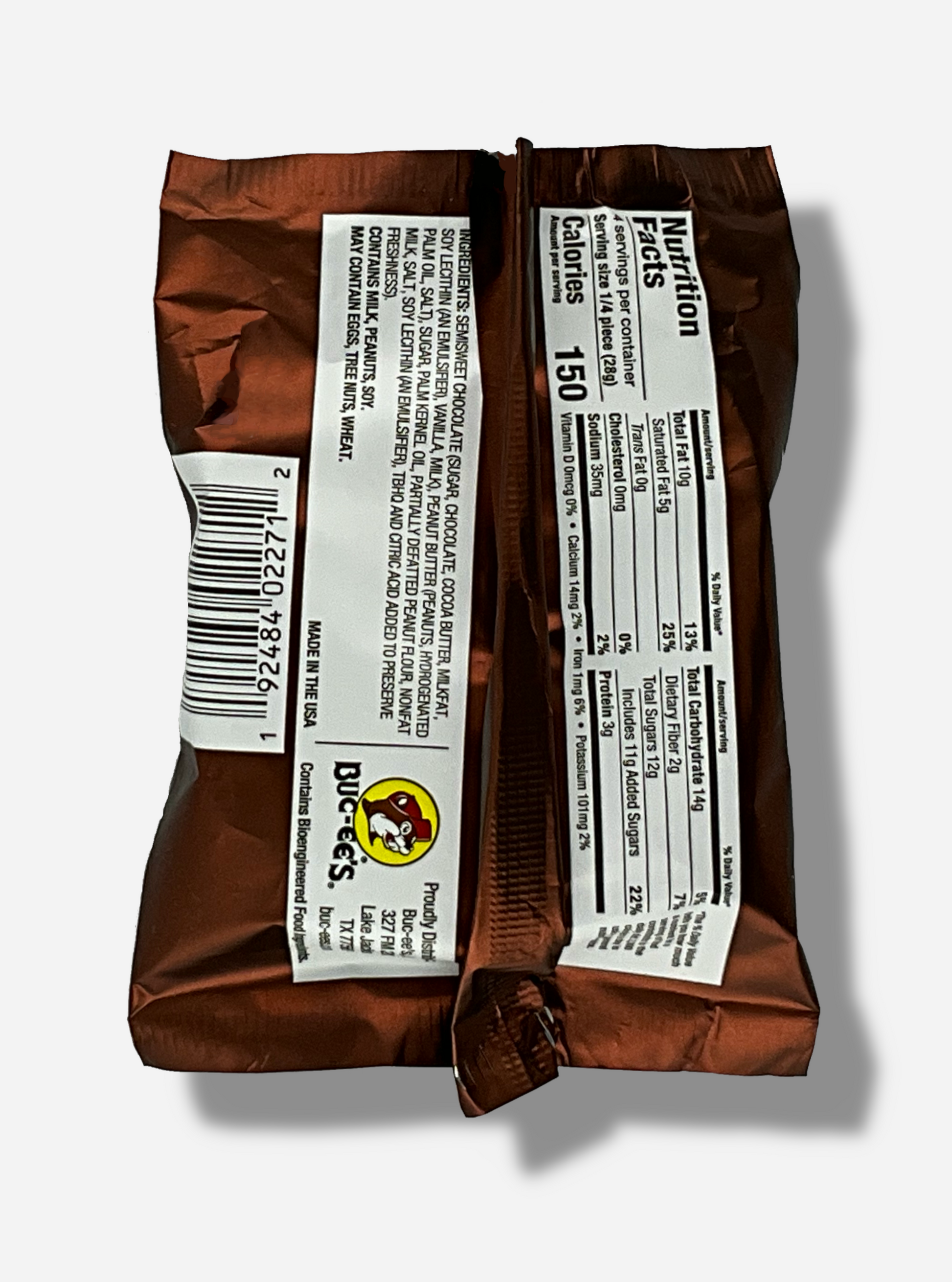 A picture of the back of a package of a dark chocolate peanut butter Buc-ee's OverBite.  The package is metallic and dark brown, and has a small picture of the Buc-ee's logo on the back.