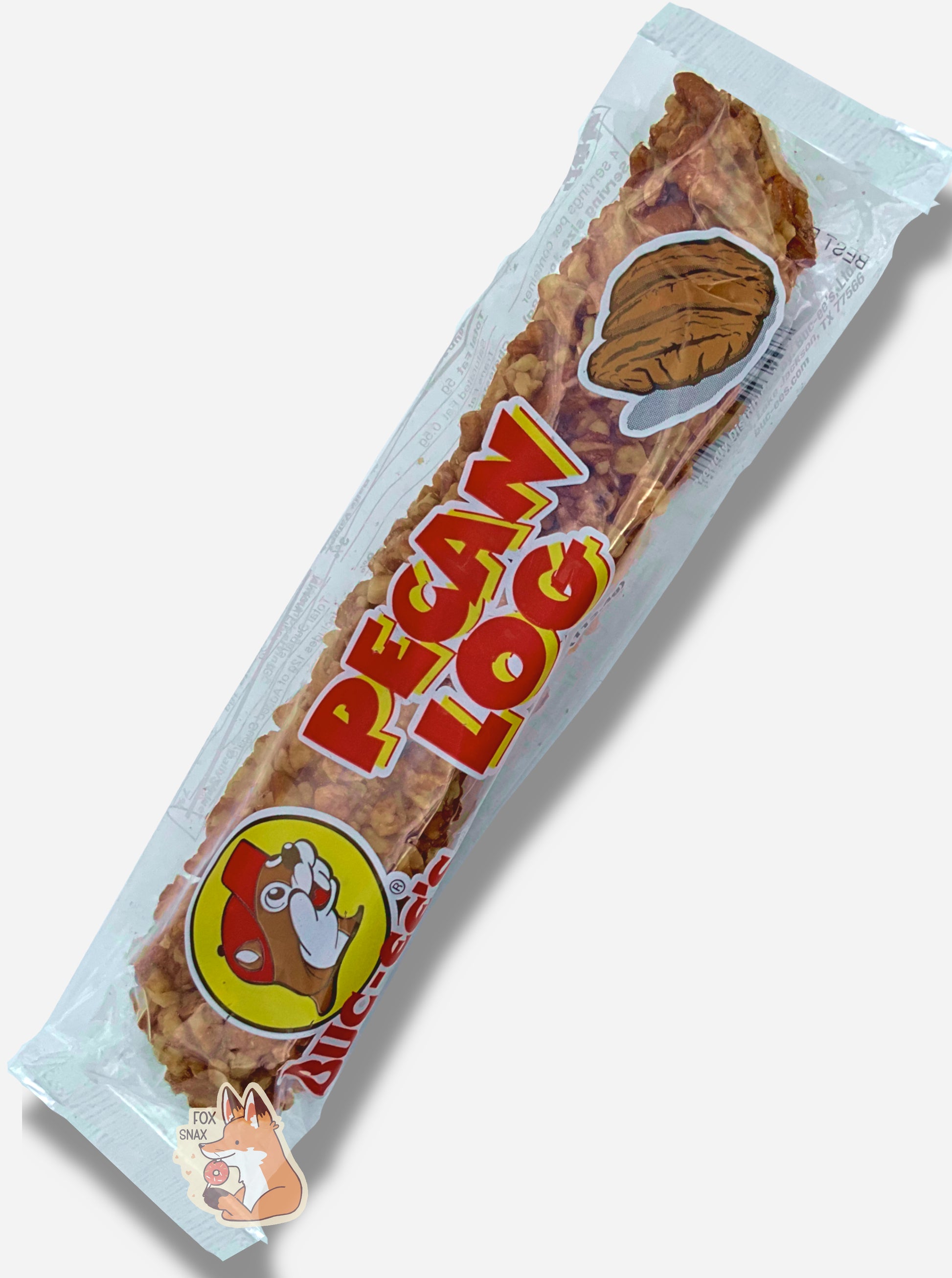 A picture of a long, rectangular, clear plastic package of Buc-ee's Pecan Log.  The bag has the Buc-ee's logo on it, and in jolly red and yellow text read "PECAN LOG", next to a picture of a single unshelled pecan.  Inside the package is a long thin cylinder; the surface of the cylinder is covered in small chopped bits of pecans.