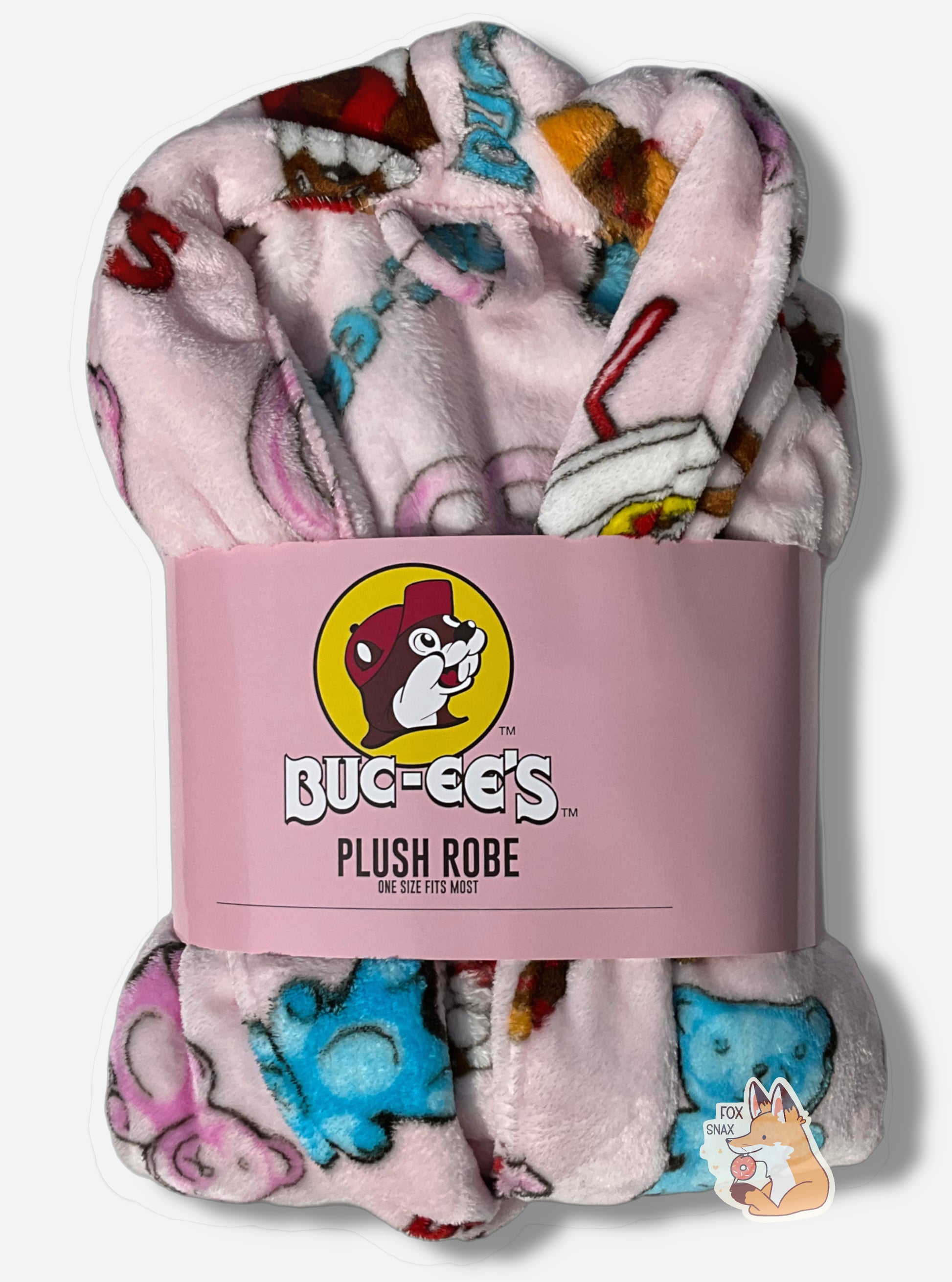 An image of a plush, wrapped, pink robe.  The surface is pink and fluffy, and is studded with blue and pink gummi bear pictures, drink cup picture, pretzels, brisket sandwiches, and the text "BUC-EE'S" in red and blue.  A cardboard wrapper around the "waist" of the robe shows the Buc-ee's logo and reads "PLUSH ROBE", then, underneath that "ONE SIZE FITS MOST"