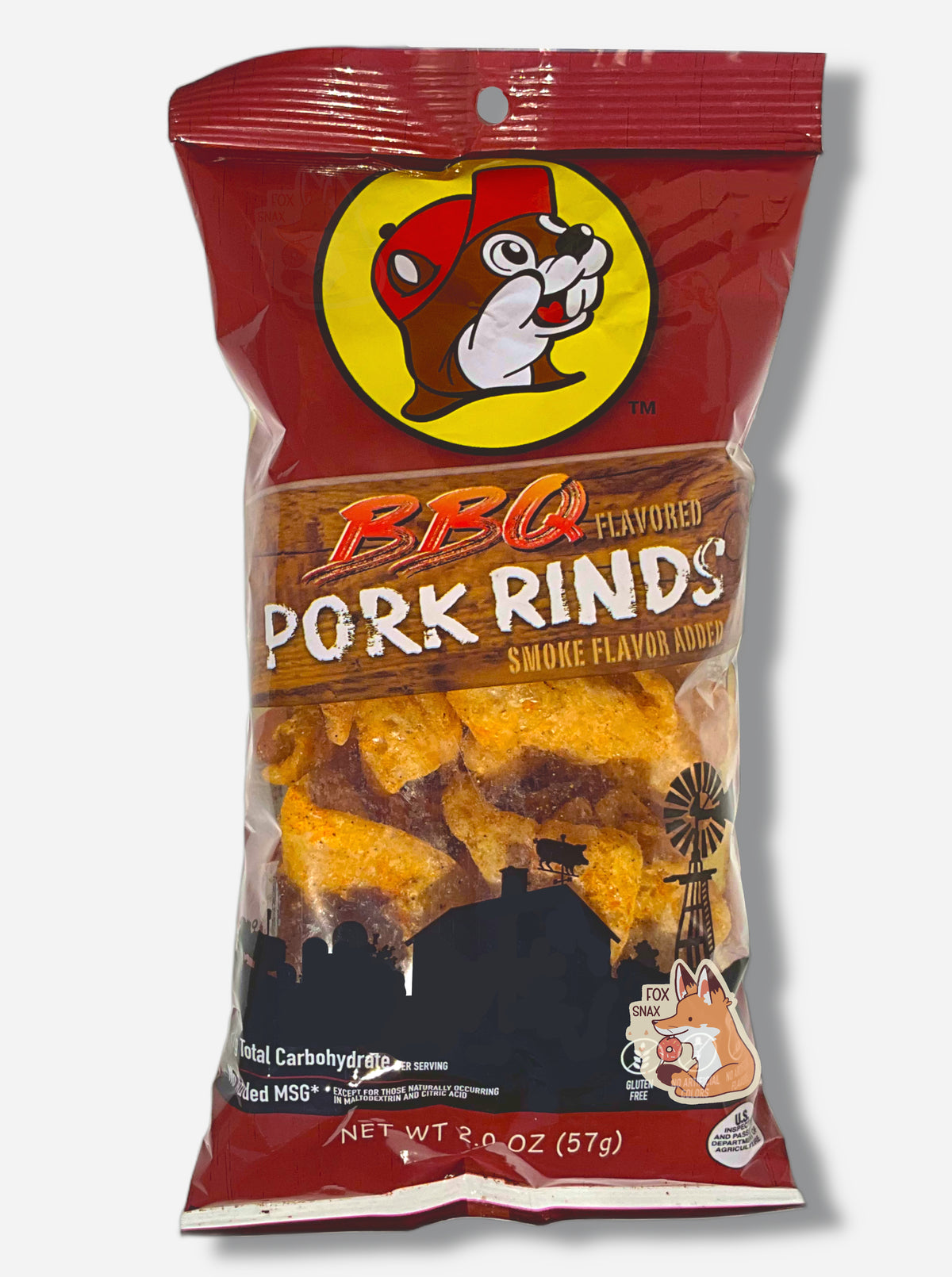 The front of a package of Buc-ee's Original Pork Rinds. The package is a clear and reddish brown plastic, roughly rectangular package, with red, orange and white text that reads BBQ Flavored PORK RINDS, then SMOKE FLAVOR ADDED.  Inside the package are a series of oblong tan pork rinds.  The bottom of the package has a black outline of a farm, and reads <1g TOTAL CARBOHYDRATE PER SERVING, and NO ADDED MSG, then NET WT 2.0 OZ (57 g)