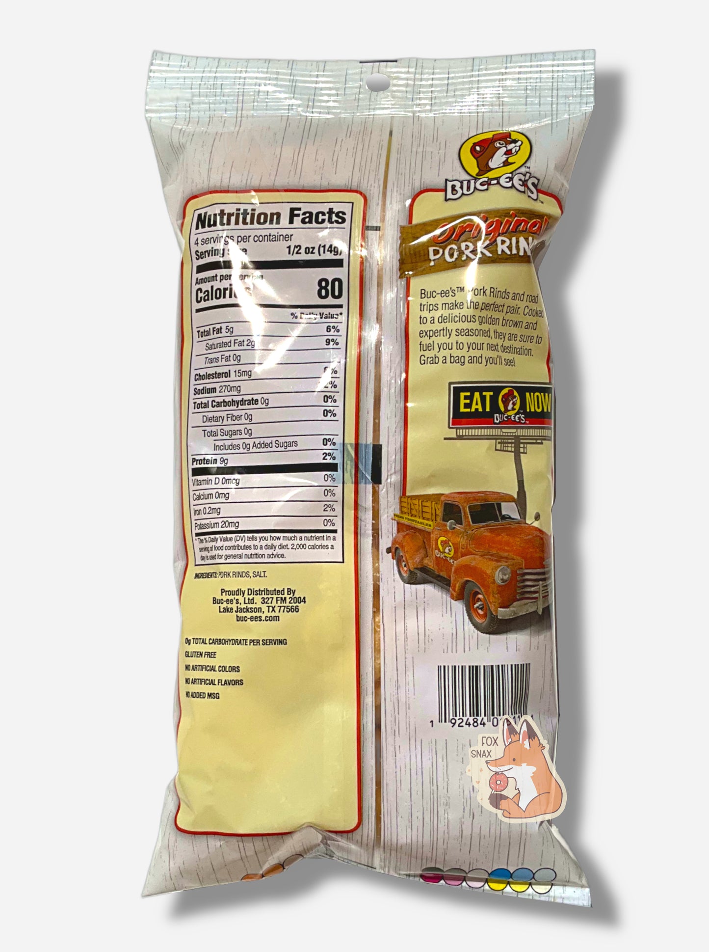 The back of a package of Buc-ee's Original Pork Rinds.  The package is a clear and white plastic, roughly rectangular package, and reads "Buc-ee's Pork Rinds and road trips make the perfect pair. Cooked to a delicious golden brown and expertly seasoned, they are sure to fuel you to your next destination. Grab a bag and you'll see!"  A picture of a Buc-ee's billboard reading EAT NOW above a old-school red pickup truck is on the lower right.  On the left of the package are nutrition facts, then ingredients.
