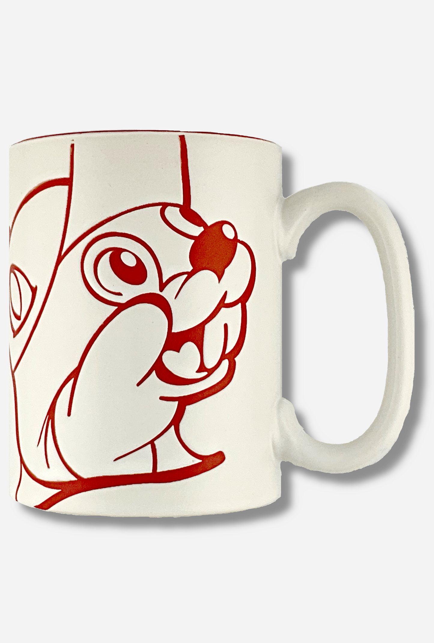 A picture of a ceramic, red and white coffee mug.  The mug prominently features a picture of Buc-ee The Beaver on the front and back, in red.  The interior of the mug is a bright red as well, and rest of the mug is white.  