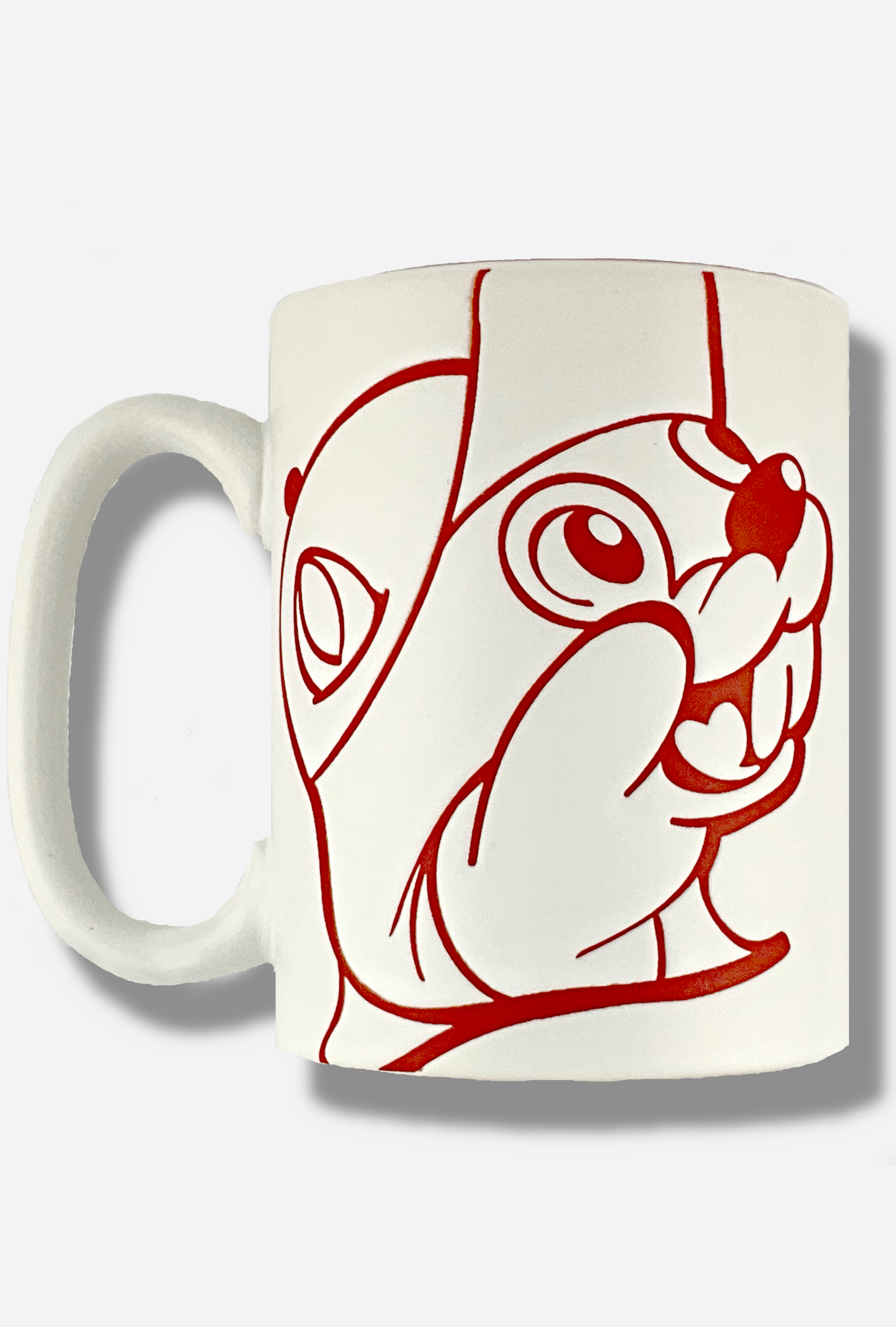 A picture of a ceramic, red and white coffee mug.  The mug prominently features a picture of Buc-ee The Beaver on the front and back, in red.  The interior of the mug is a bright red as well, and rest of the mug is white.  